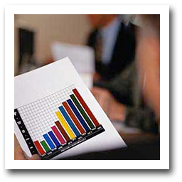 Business person looking at graph